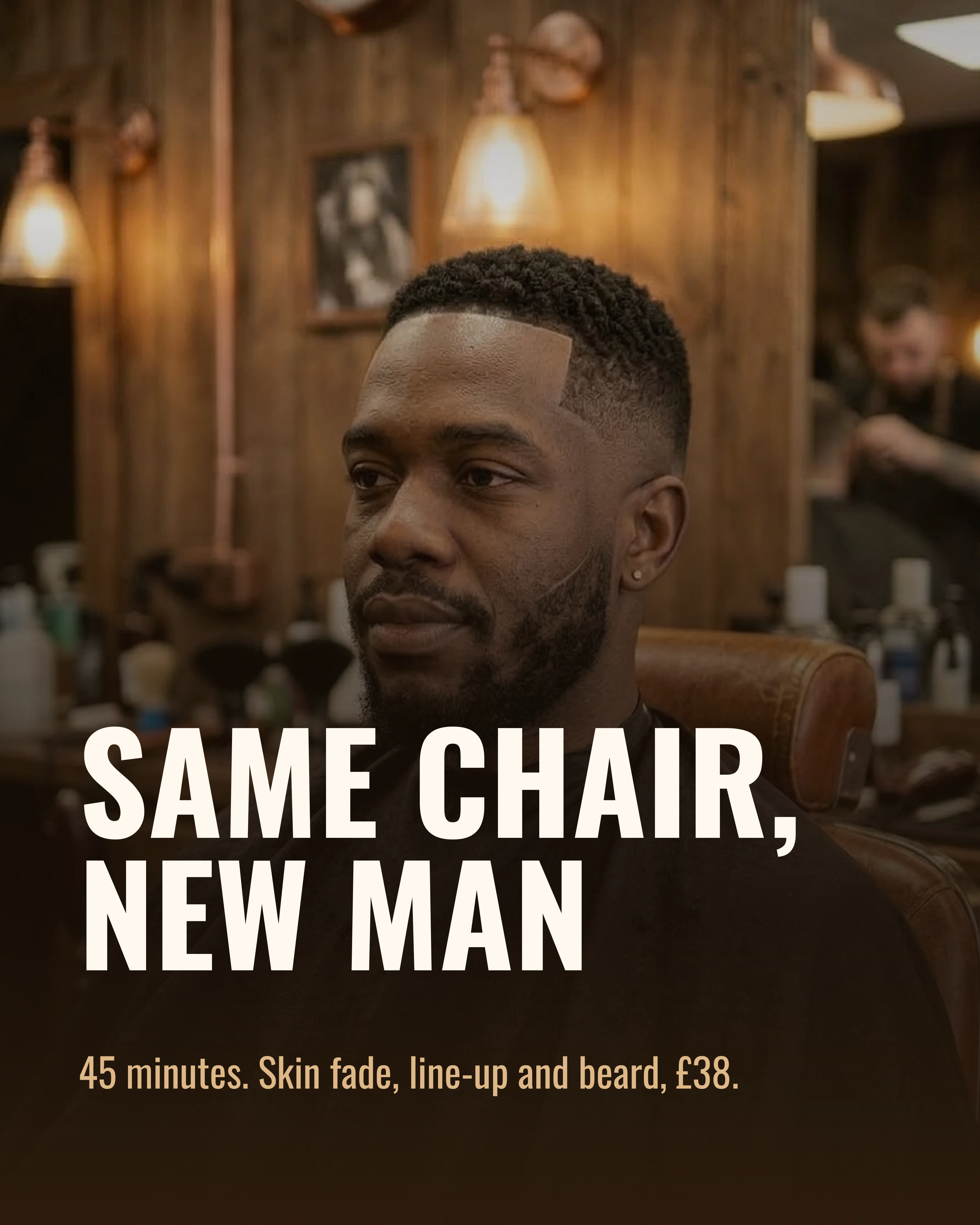 The finished skin fade and beard on the same client, front view