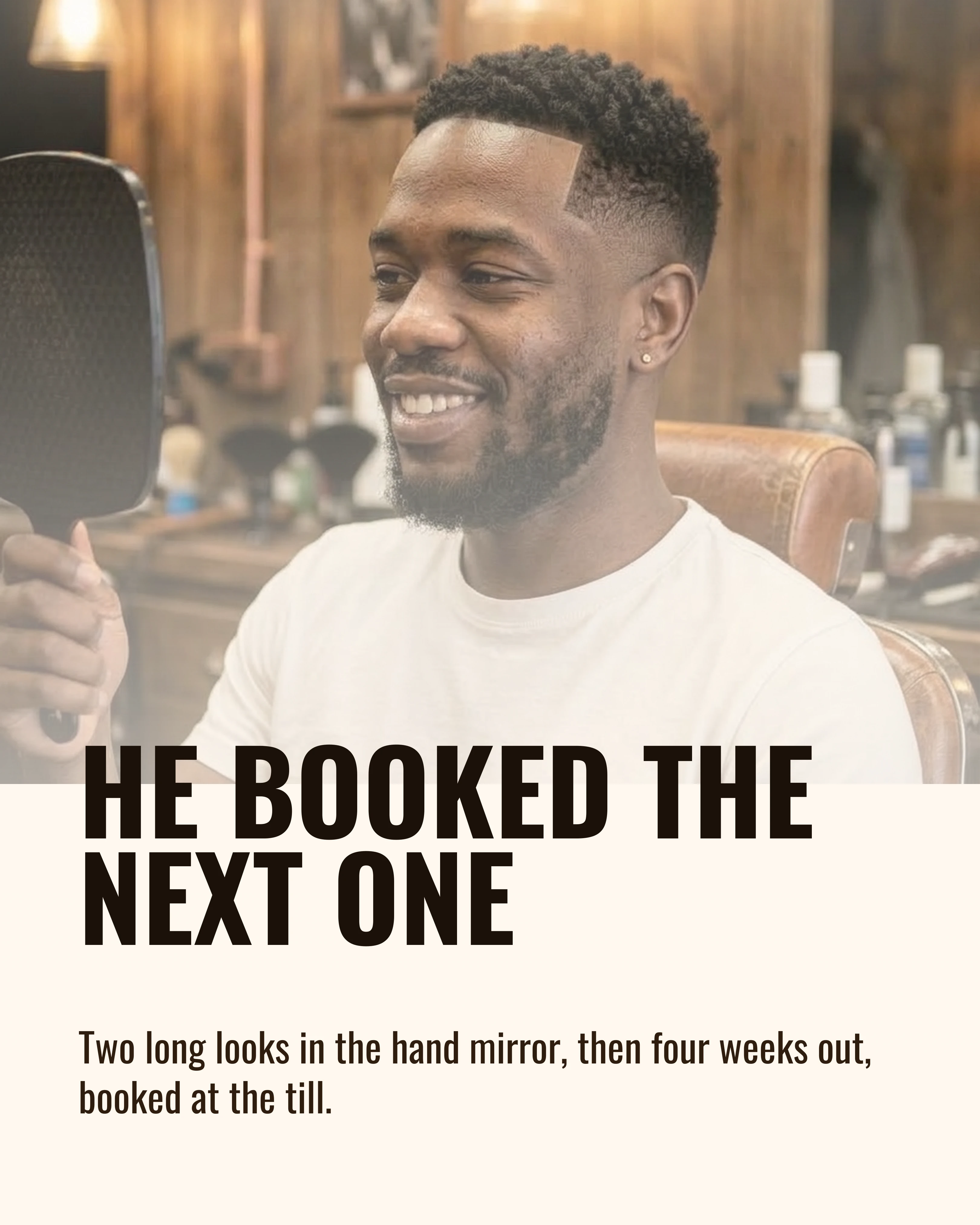 The client smiling at the result in a hand mirror